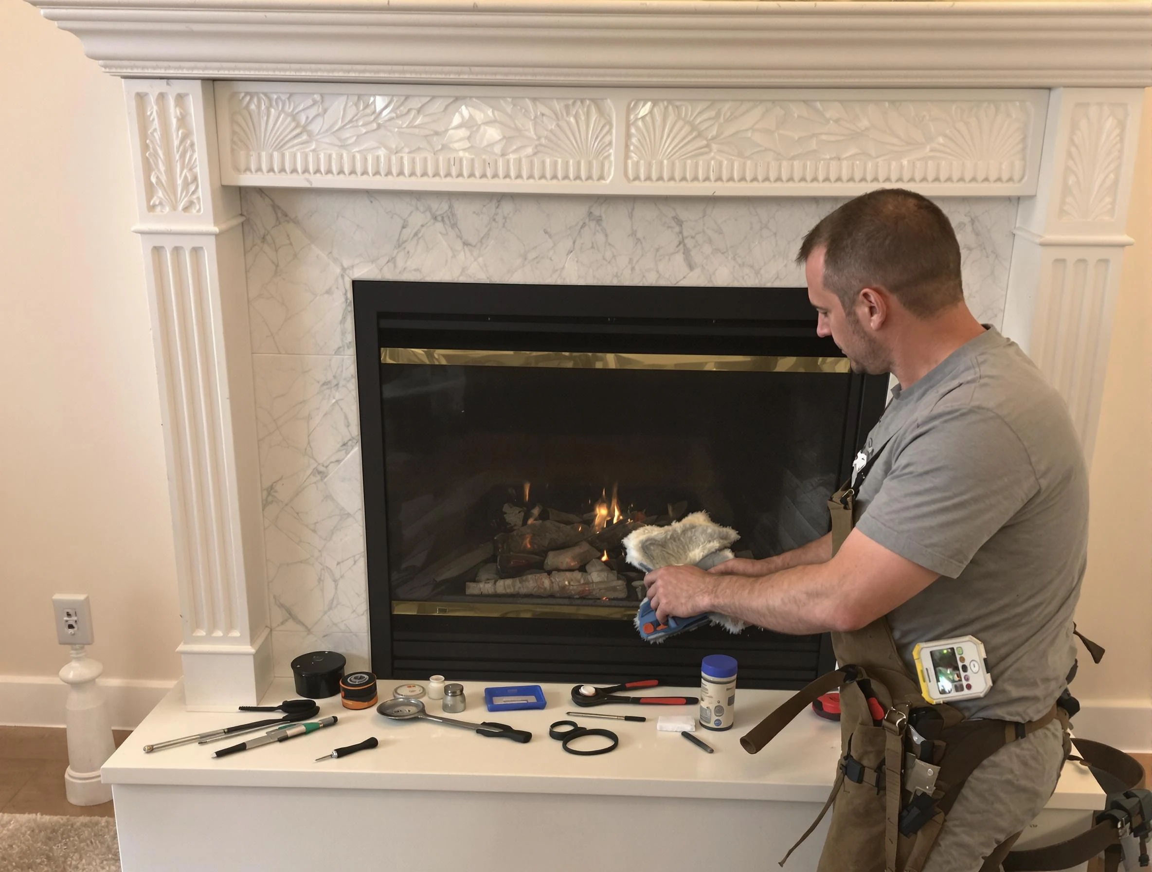 Vinings Chimney Sweep performing fireplace maintenance in Vinings, GA